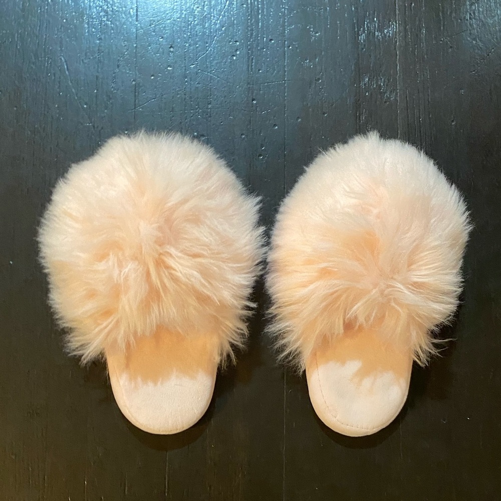 Fluffy pale pink slippers